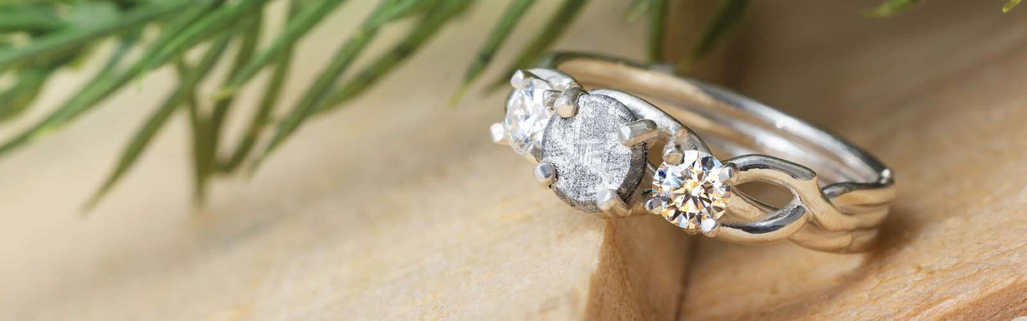 Nature-Inspired Engagement Ring on wooden surface