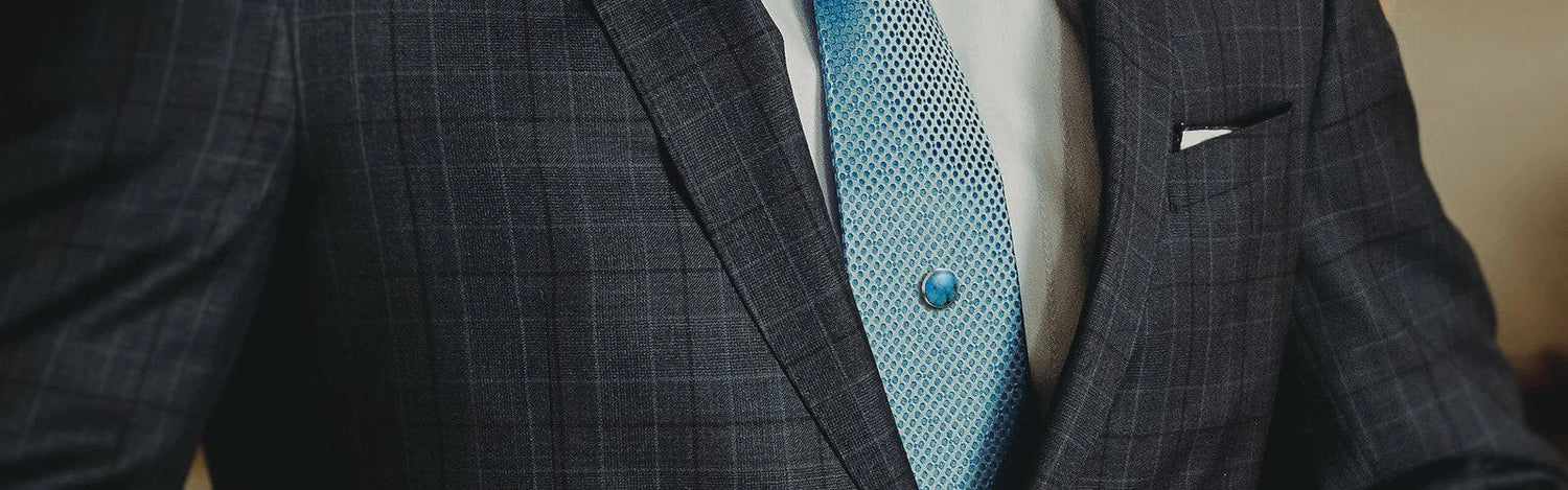 Men's Suit with Blue Tie and Tie Tack