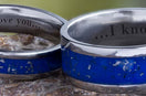 Two Stardust wedding bands with text engraving.