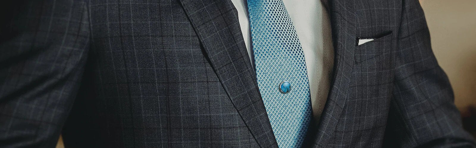 Men's Suit with Blue Tie and Tie Tack