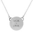Engraved back of meteorite necklace with initials
