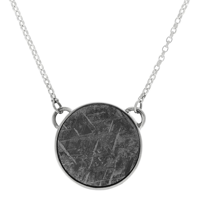 Close-up of meteorite round bezel necklace