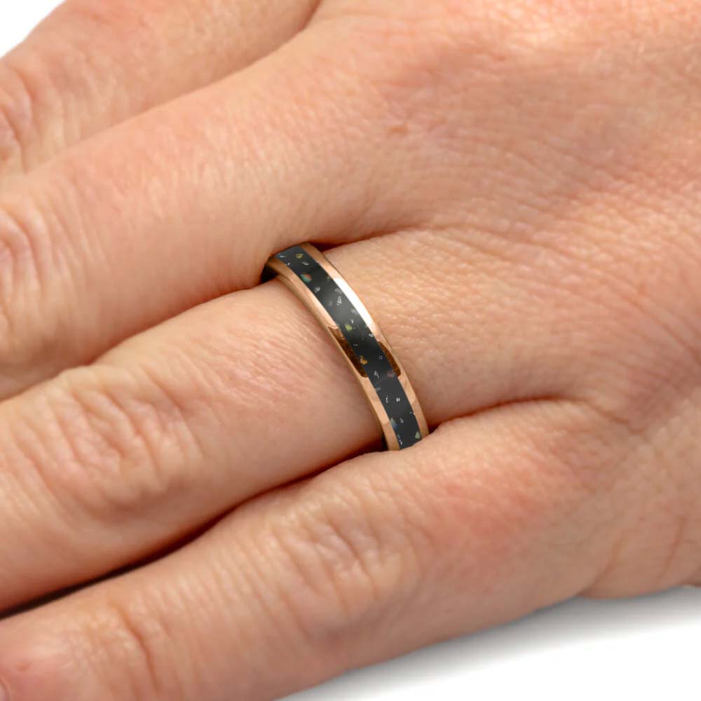 Custom Black Opal Stardust Wedding Band in Rose Gold worn on hand, showing the 3mm width and shimmering opal inlay for a modern bridal look.