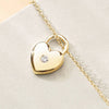 Heart lock necklace with white sapphire on chain