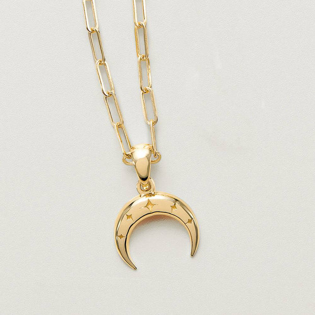 Gold crescent moon necklace with star details