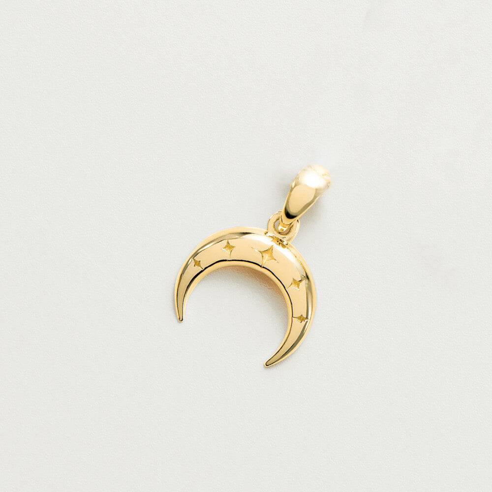 Gold crescent moon pendant with star engravings