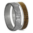 Meteorite and whiskey barrel oak ring inlays side by side