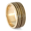 Side view of rose gold whiskey barrel wedding band