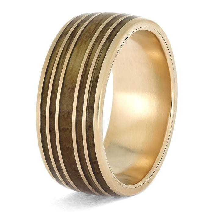 Angled view of rose gold whiskey barrel wedding band