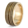 Angled view of rose gold whiskey barrel wedding band