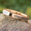 Rose gold meteorite ring with black diamond on rock
