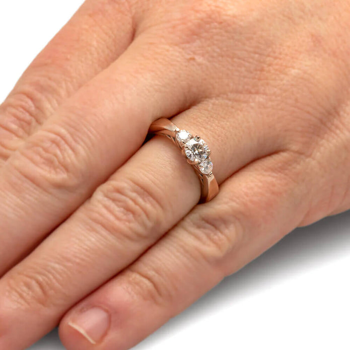 Three Stone Engagement Ring in Rose Gold