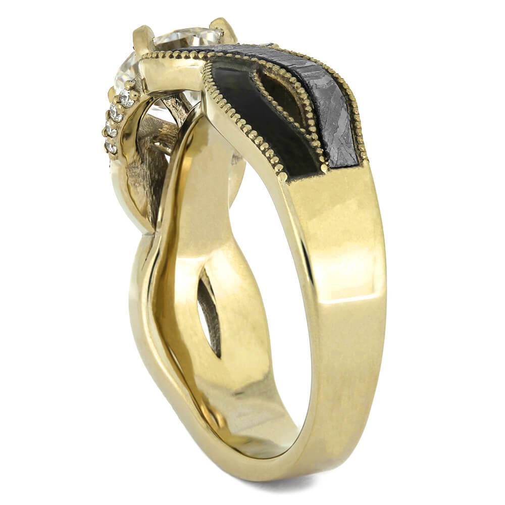 Side view of yellow gold ring with meteorite inlay