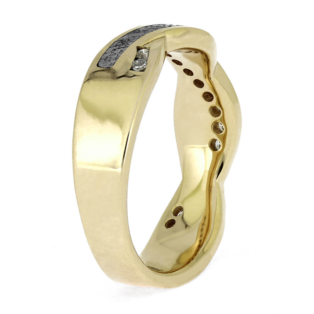 Side angle of polished gold wedding band highlighting the smooth finish and partial inlay of meteorite and diamonds. Elegant and modern design.