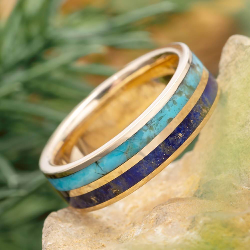 Elegant lapis lazuli and turquoise wedding band on display