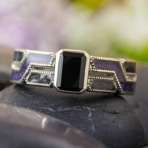 Black engagement ring with onyx and amethyst, front view