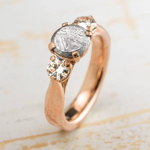 Three Stone Engagement Ring in Rose Gold