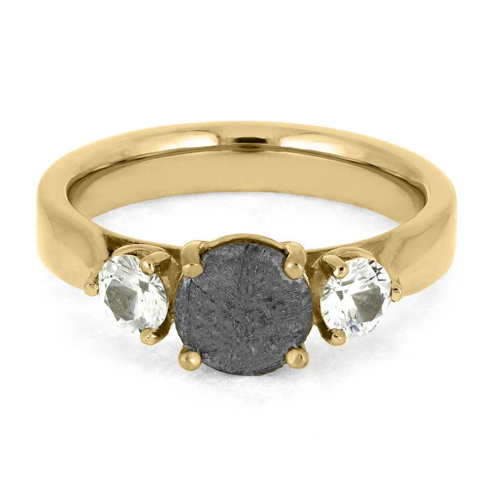 Top view of meteorite engagement ring with three stones