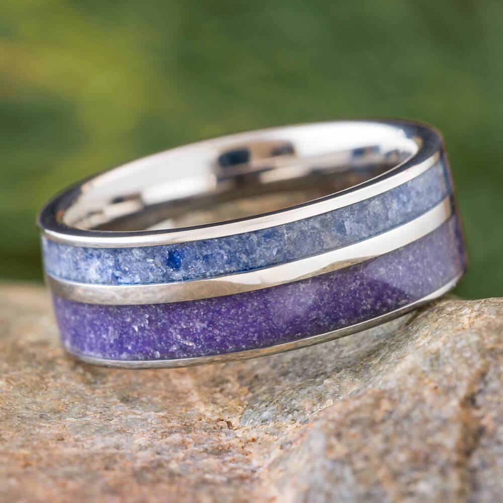 Titanium wedding band with crushed amethyst and tanzanite inlay.