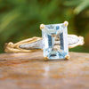 Emerald-cut aquamarine ring with meteorite inlay