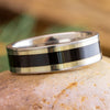 Titanium ring with blackwood and white gold pinstripes on stone