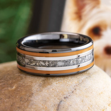 Orange Memorial Ring with Enamel and Black Ceramic featuring triple inlays of orange enamel, titanium pinstripe, and ash-infused center on a polished black ceramic band.