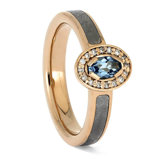 Rose gold ring with meteorite inlay and topaz center stone