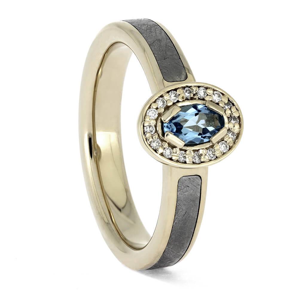 Oval-cut topaz halo ring with meteorite and white gold
