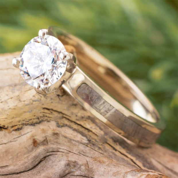 1.5 CT white gold ring with meteorite inlay on wood