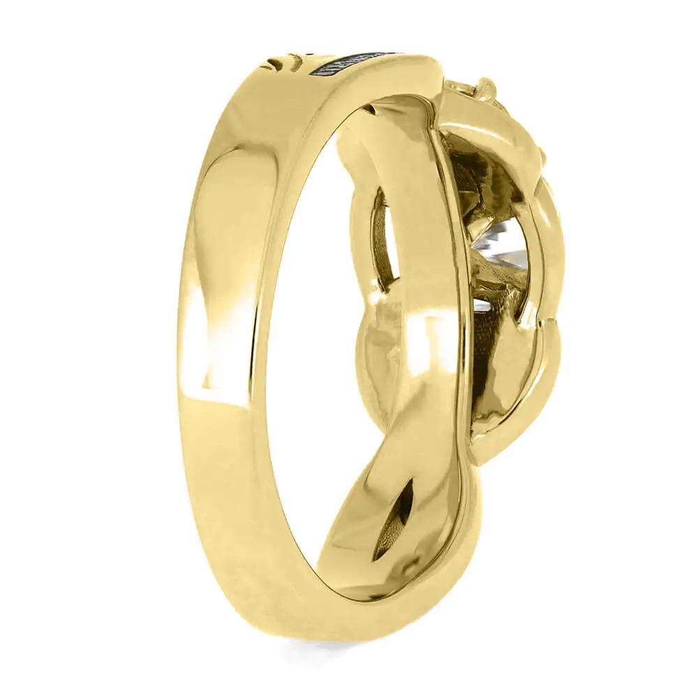 Side view of yellow gold engagement ring with polished finish