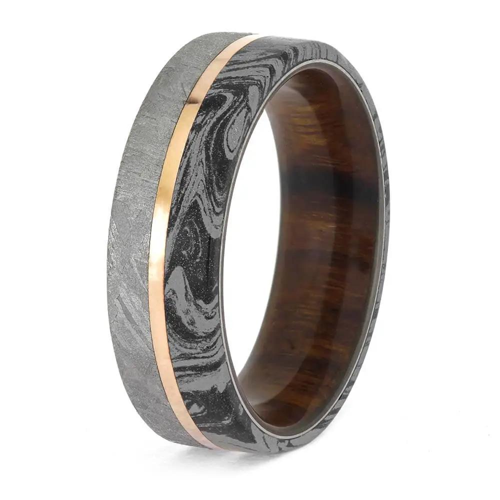 Unique mokume gane wedding band with rose gold detail