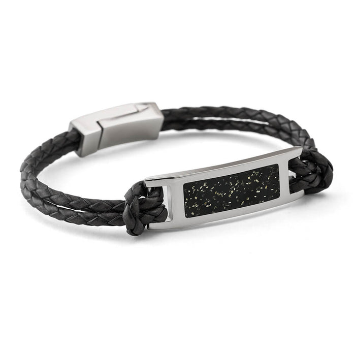 Black braided leather bracelet with silver tag on a white background