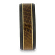 Side profile of gold and black zirconium wedding band with whiskey oak wood inlay, highlighting the beveled edges and wood grain texture.