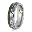 Custom titanium ring with dual inlays of green peridot and white pearl, accented by a recessed bezel-set peridot gemstone.