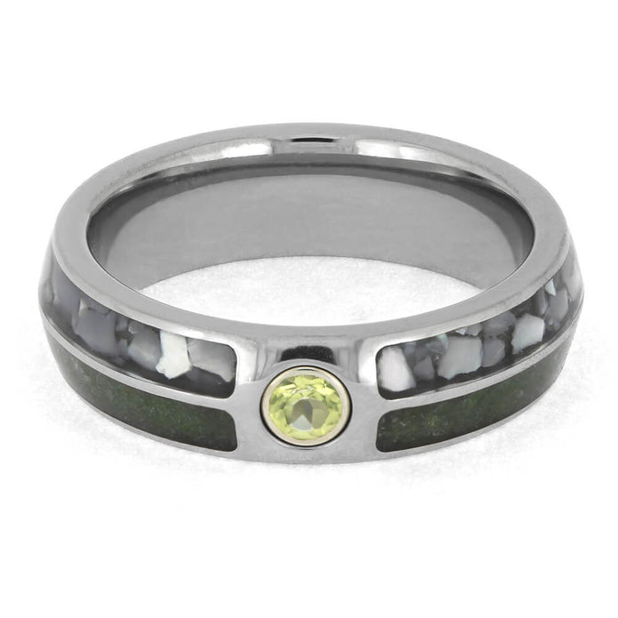 Colorful birthstone wedding band with polished titanium finish, featuring crushed gemstone inlays and a centered peridot stone.