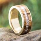 White gold ring with pearl and olive wood inlay on stone