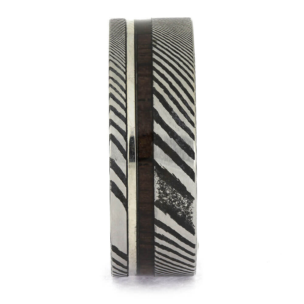 Ring with black and white striped pattern on a white background