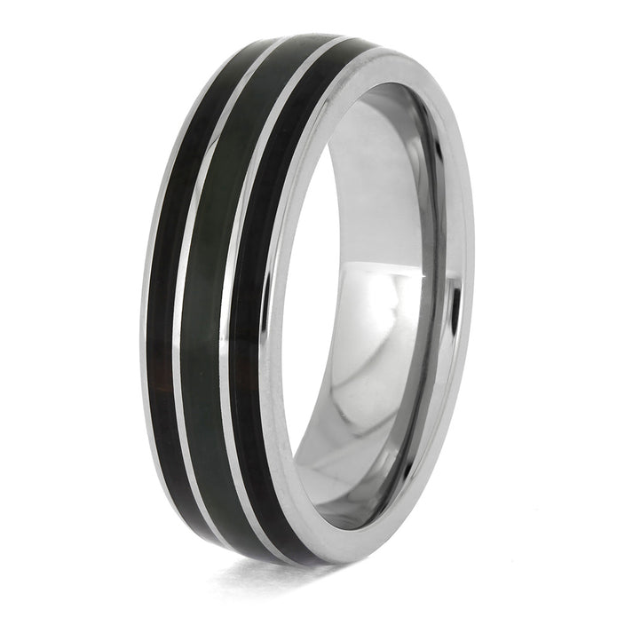 Silver ring with black inlay on a white background