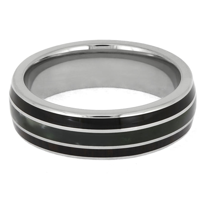 Silver ring with black inlay on a white background