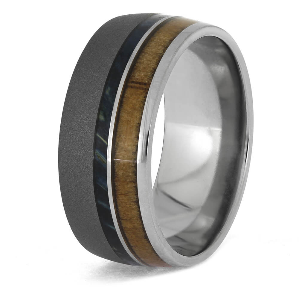 Multicolored ring with a wooden inlay on a white background
