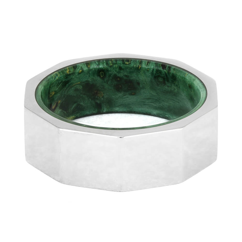Ring with green interior and silver exterior on a white background