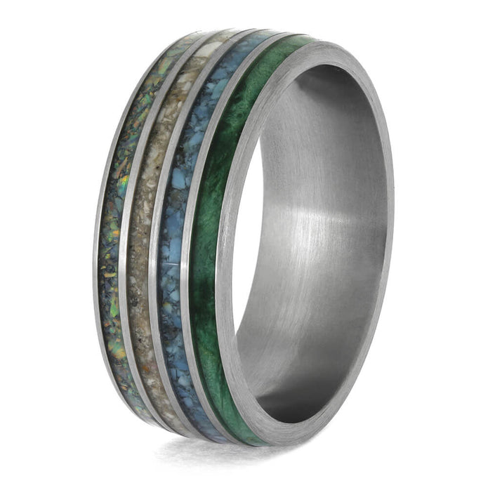 Silver ring with multicolored inlay on a white background