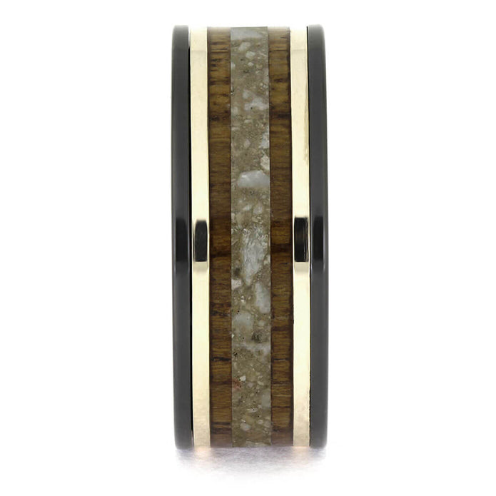 Ring with wooden and stone inlay on a white background