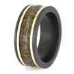 Black ring with wooden and stone inlay on a white background