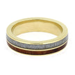Gold ring with a gray and brown inlay on a white background