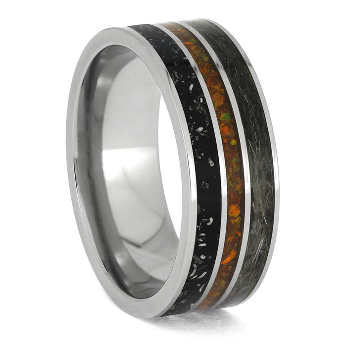 Ring with metallic and multicolored inlay on a white background