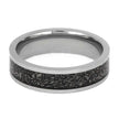 Silver ring with a black textured band on a white background