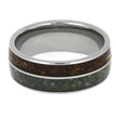 Ring with metallic and wooden inlay on a white background