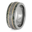 Ring with metallic band and textured inlay on a white background