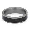 Silver ring with a black carbon fiber inlay on a white background
